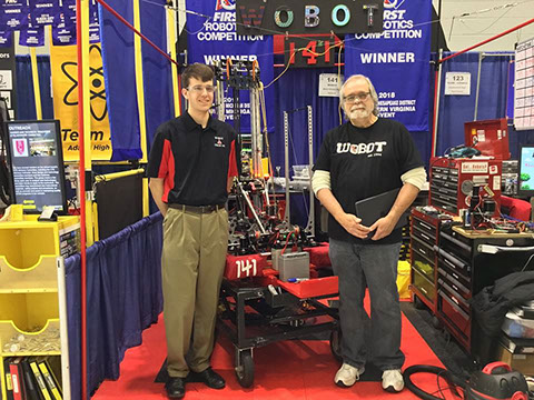 On Dean's List winner Drew  with his mentor, Pat Lamotte, in the pit before his  interview for the next level.