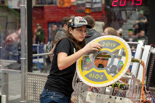 One of our students prepping the robot before a match