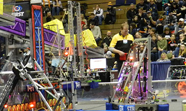 Our robot climbing the bar at the end of the game.