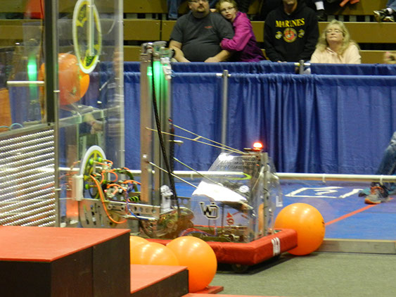 Our robot taking a hatch piece from the loading station