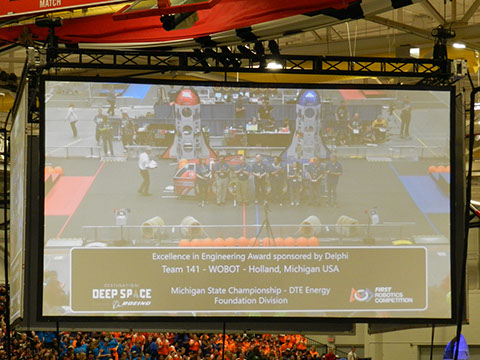 A view of the big screen showing that our team won the Excellence in Engineering Award