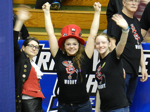 Taylor, Hannah, and Katie waving Hi up to the stands while we cheered!