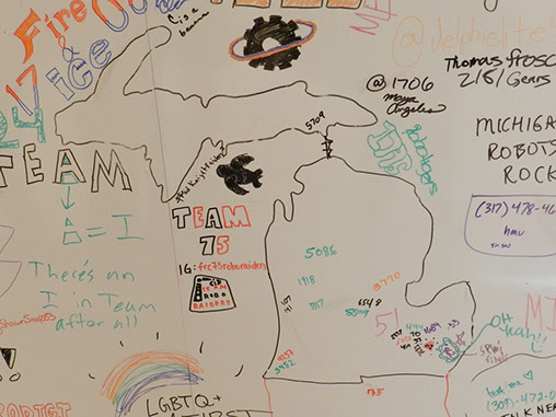 Someone drew the state of Michigan on the community white board; which then started teams from Michigan and Indiana to label where they're  from.