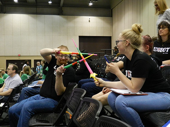 Having a little fun in the stands between matches.