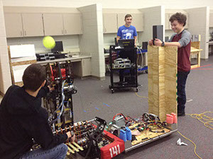 Students programming the robot