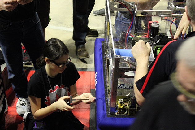 Taylor working on changing the bumpers for our next match