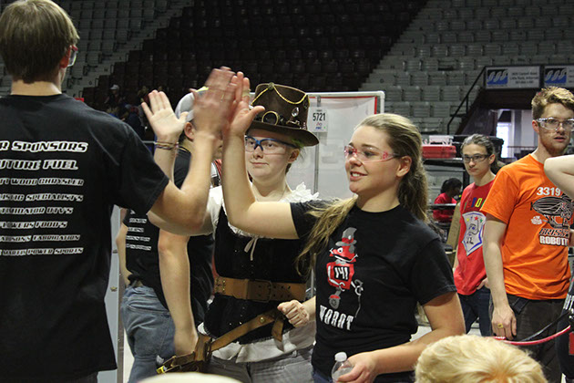 Celebratory high five after a good match.