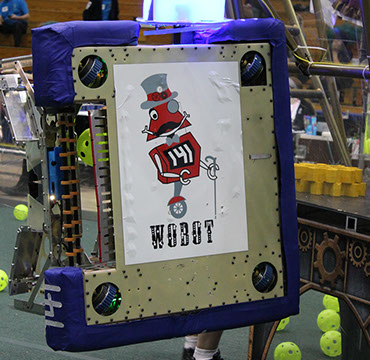 Our robot displaying our Steampunked Wobot while hanging on the airship!