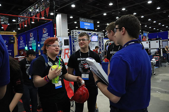 Our team talking to the judges