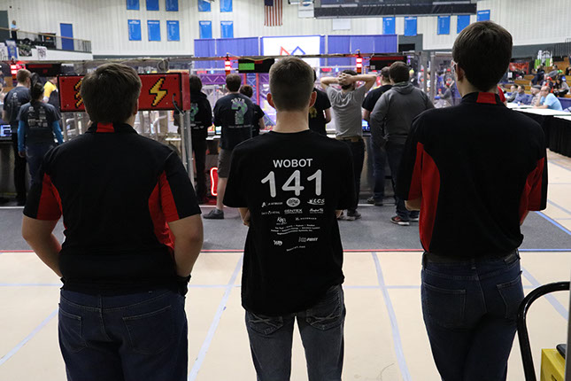 Drive team watching the match while waiting in que for our next match.